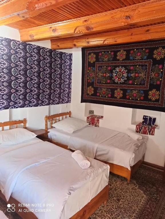 Номер (Односпальная кровать в общем номере для женщин) отеля MEKHTAR AMBAR Caravan Sarai XIX, Бухара
