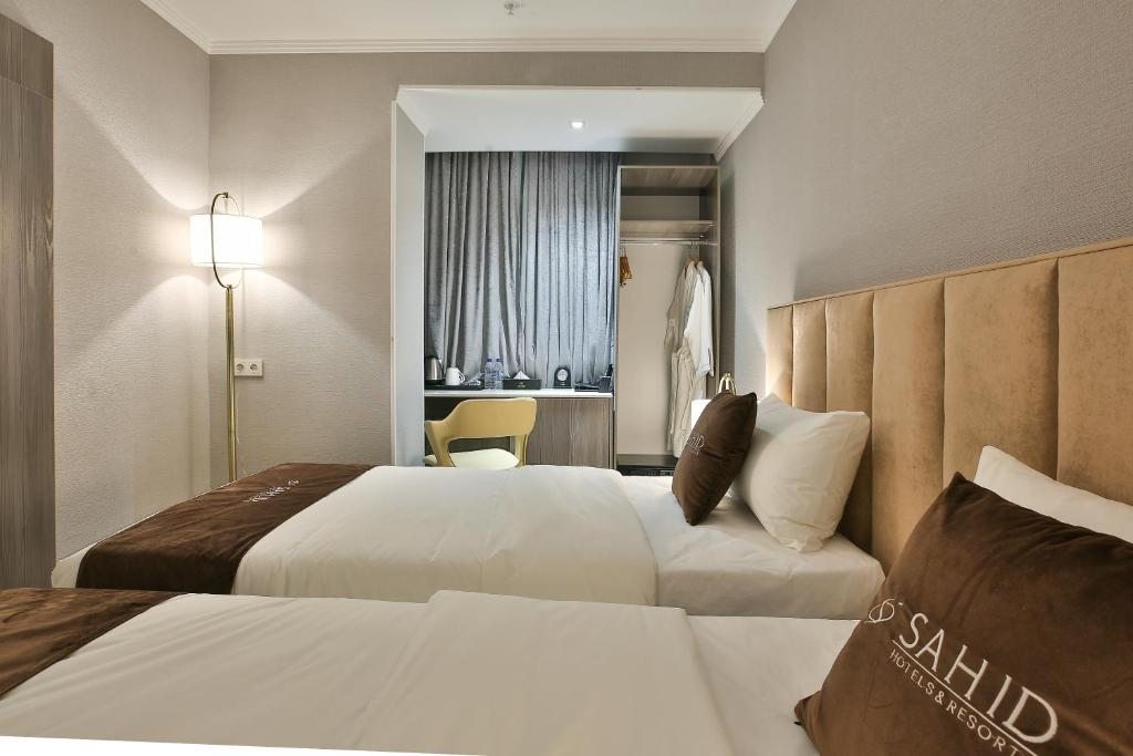 Двухместный (Улучшенный двухместный номер с 1 кроватью или 2 отдельными кроватями) отеля Sahid Zarafshon, Бухара