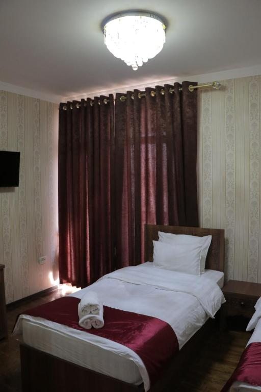Двухместный (Двухместный номер с 2 отдельными кроватями и балконом) отеля Villa Oasis, Бухара