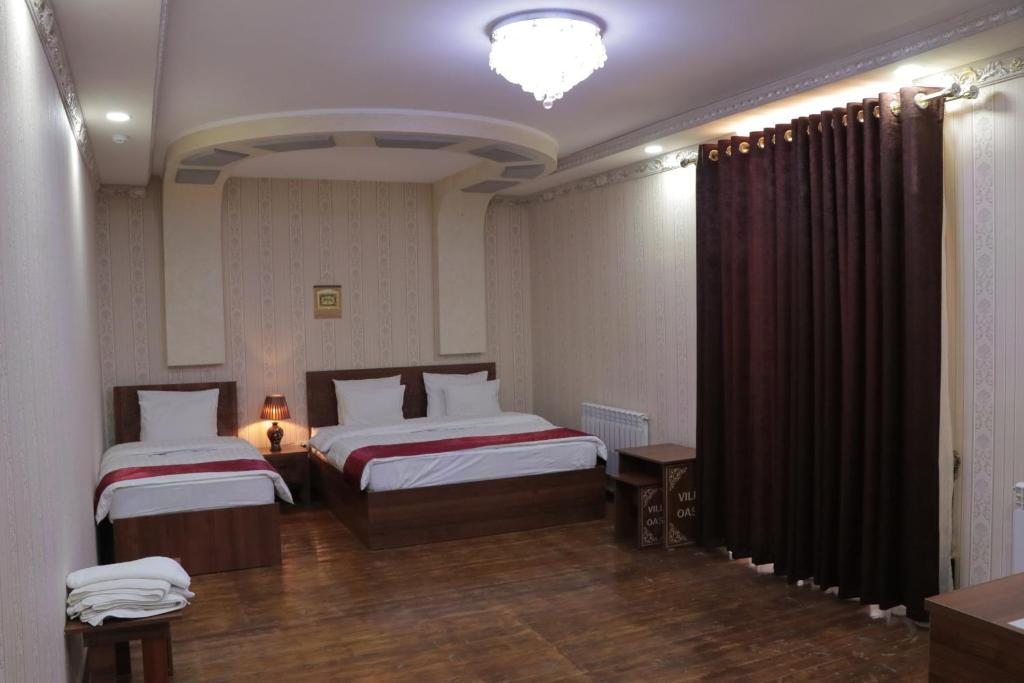 Двухместный (Двухместный номер Делюкс с 1 кроватью или 2 отдельными кроватями) отеля Villa Oasis, Бухара