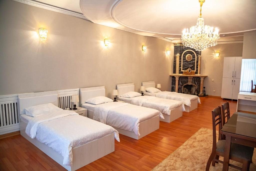 Четырехместный (Четырехместный номер с собственной ванной комнатой) отеля Ridon Lux Hotel, Ташкент