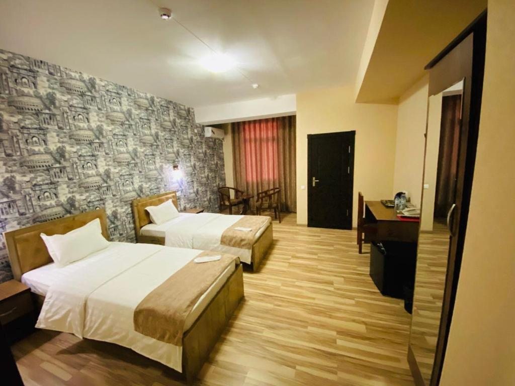 Двухместный (Двухместный номер Делюкс с 2 отдельными кроватями) отеля Tourist Inn HOTEL, Ташкент