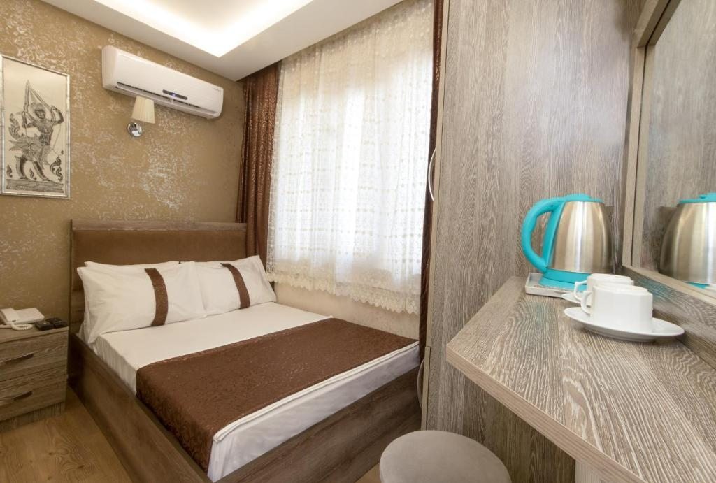 Двухместный (Небольшой двухместный номер с 1 кроватью) отеля carvan hotel, Стамбул
