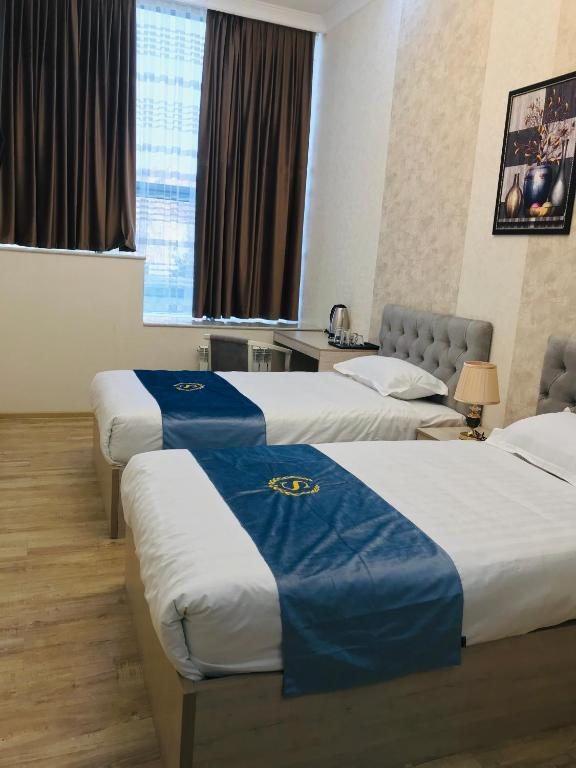 Двухместный (Двухместный номер с 2 отдельными кроватями) отеля WANTONG HOTEL, Ташкент
