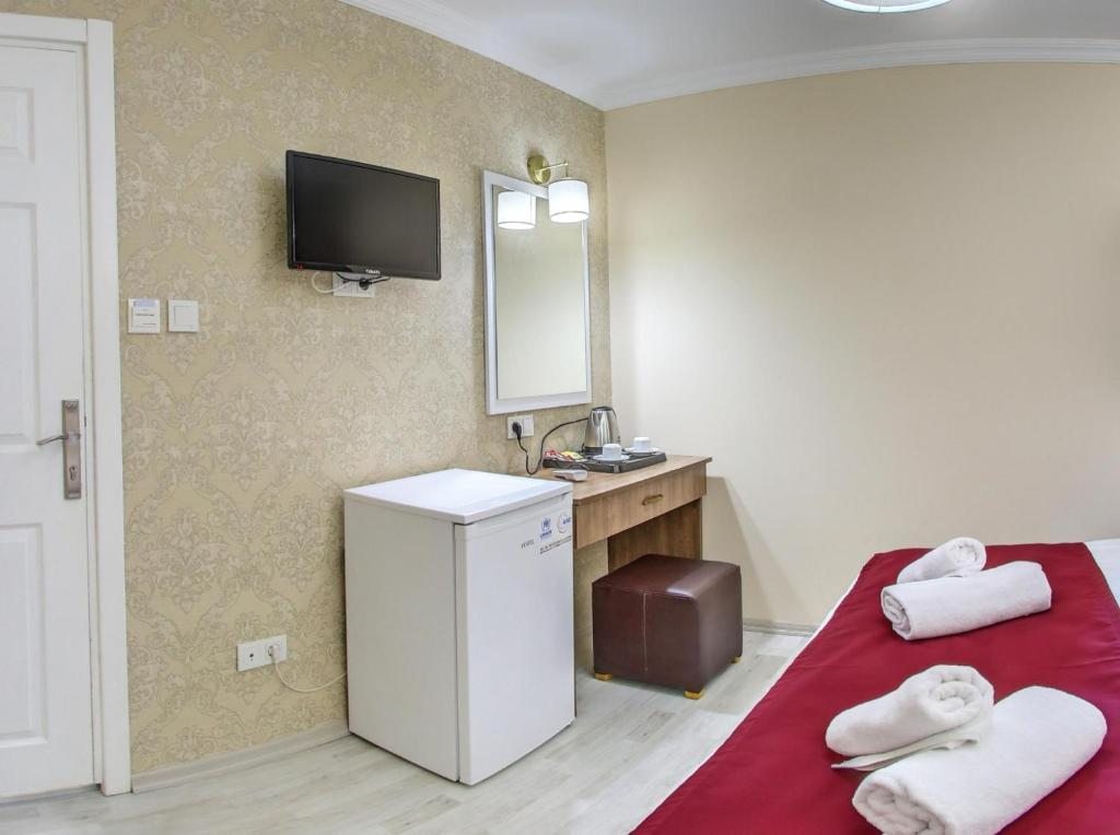 Двухместный (Двухместный номер эконом-класса с 1 кроватью или 2 отдельными кроватями) отеля Cihangir Palace Hotel, Стамбул