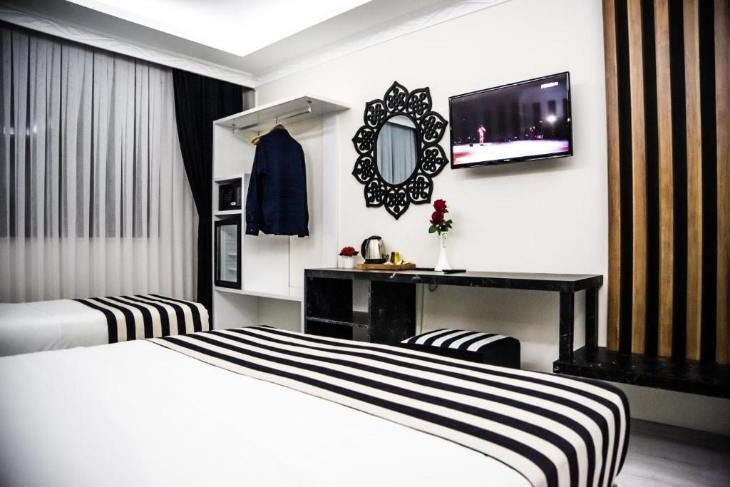 Двухместный (Двухместный номер Делюкс с 1 кроватью или 2 отдельными кроватями) отеля Cnr İnci Hotel, Стамбул