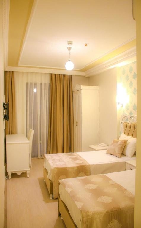 Двухместный (Двухместный номер Делюкс с 1 кроватью) отеля Deluxe Newport Hotel, Стамбул