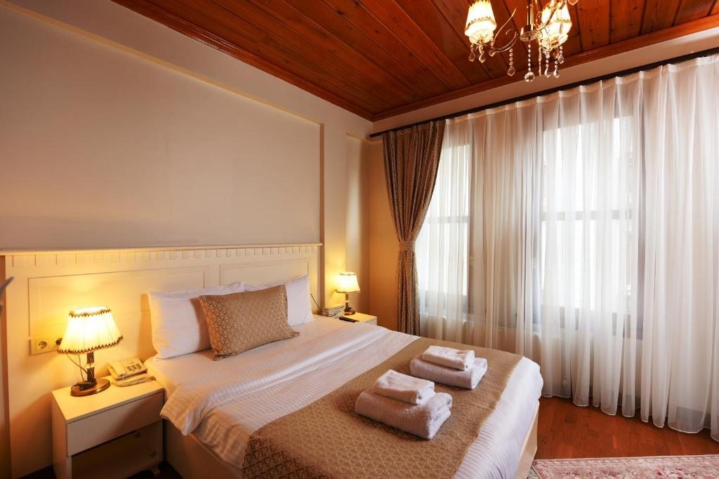 Четырехместный (Номер с 2 кроватями размера «queen-size») отеля Elyka Hotel, Стамбул