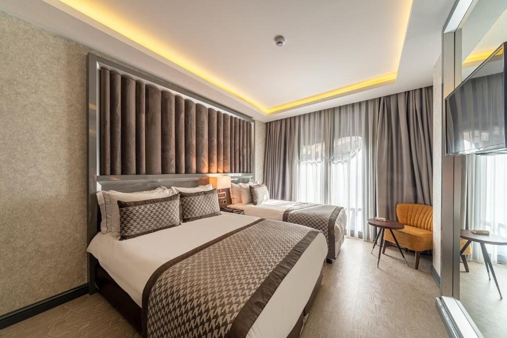 Трехместный (Улучшенный трехместный номер) отеля Euro Design Hotel, Стамбул