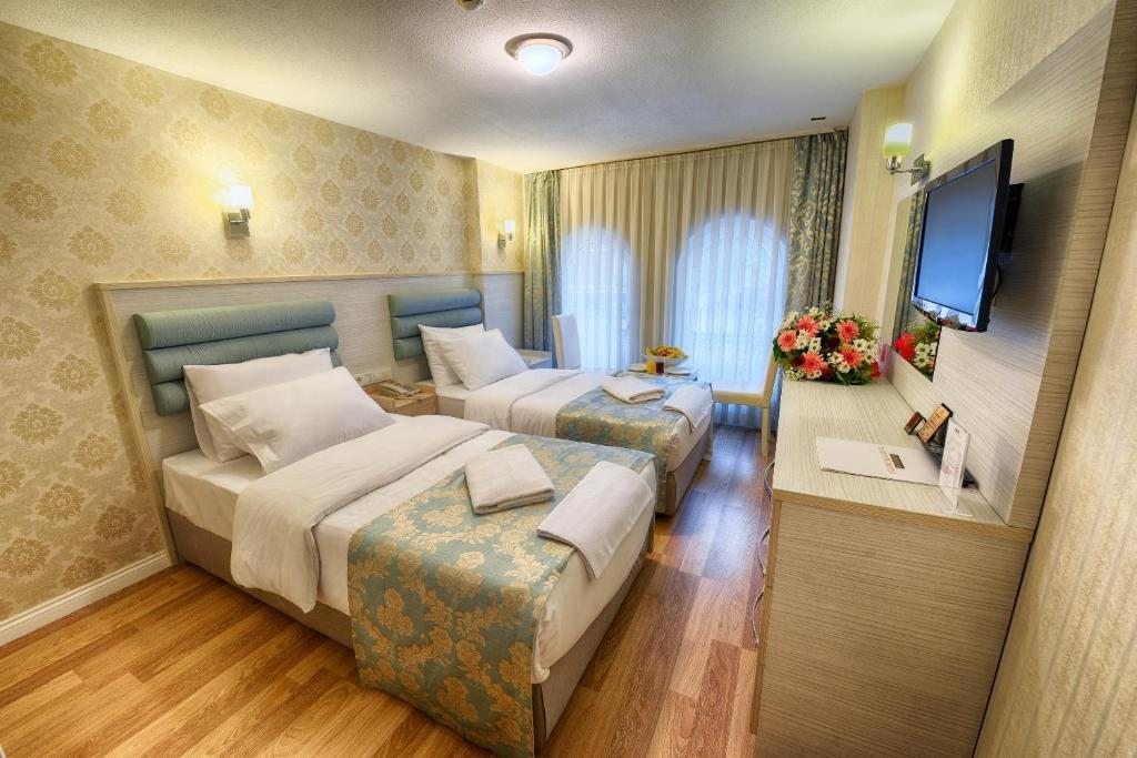 Двухместный (Двухместный номер Делюкс с 2 отдельными кроватями) отеля Florenta Hotel, Стамбул