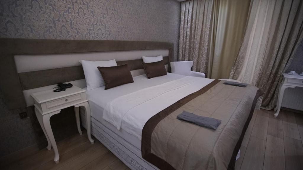 Двухместный (Двухместный номер Делюкс с 1 кроватью или 2 отдельными кроватями, вид на город) отеля Florya House Hotel, Стамбул