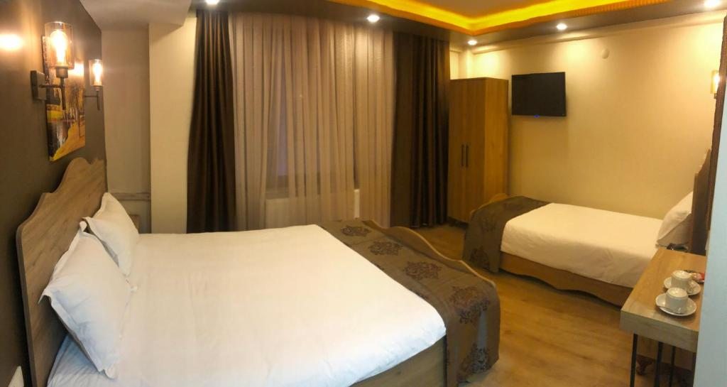 Двухместный (Стандартный двухместный номер с 1 кроватью или 2 отдельными кроватями) отеля Golden Sail Hotel Old City, Стамбул