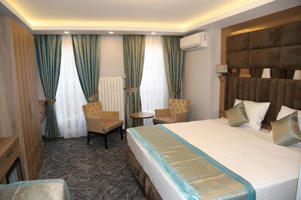 Двухместный (Двухместный номер Делюкс с 1 кроватью) отеля Grand Kavi Hotel, Стамбул