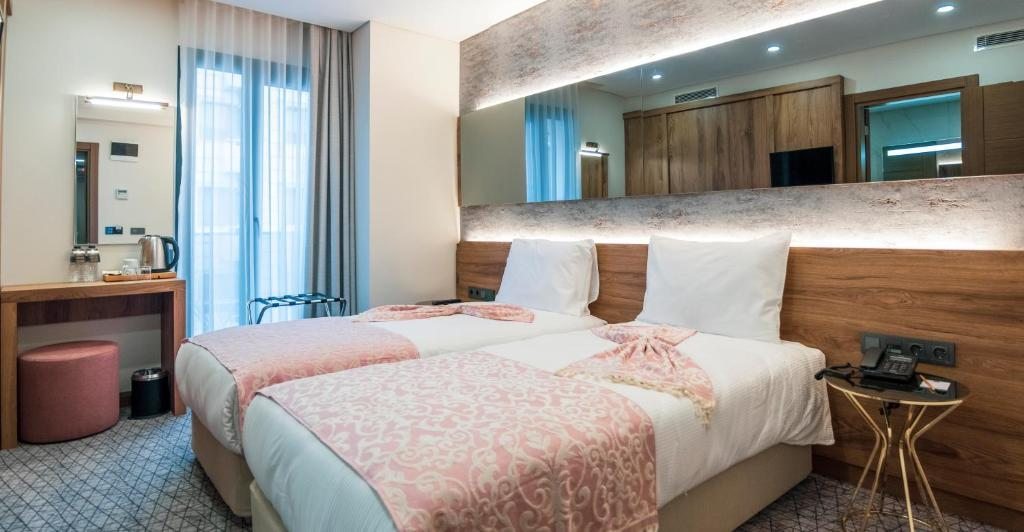 Двухместный (Стандартный двухместный номер с 1 кроватью или 2 отдельными кроватями) отеля Graziella Gold Hotel, Стамбул