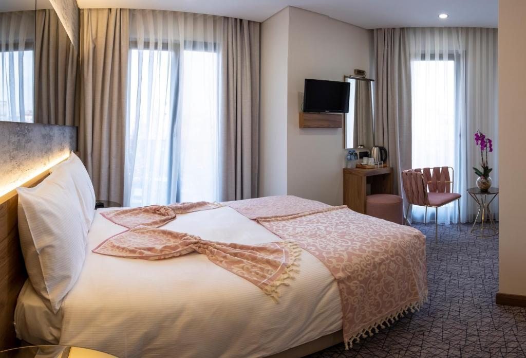 Двухместный (Двухместный номер Делюкс с 1 кроватью или 2 отдельными кроватями) отеля Graziella Gold Hotel, Стамбул