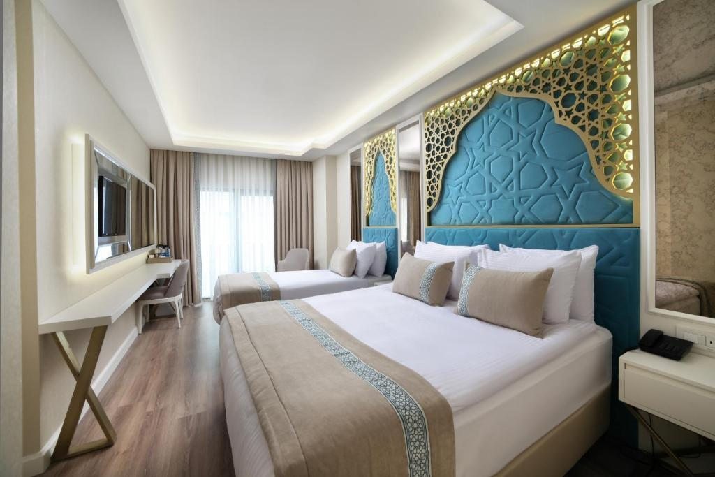 Трехместный (Улучшенный трехместный номер) отеля Great Fortune Design Hotel, Стамбул