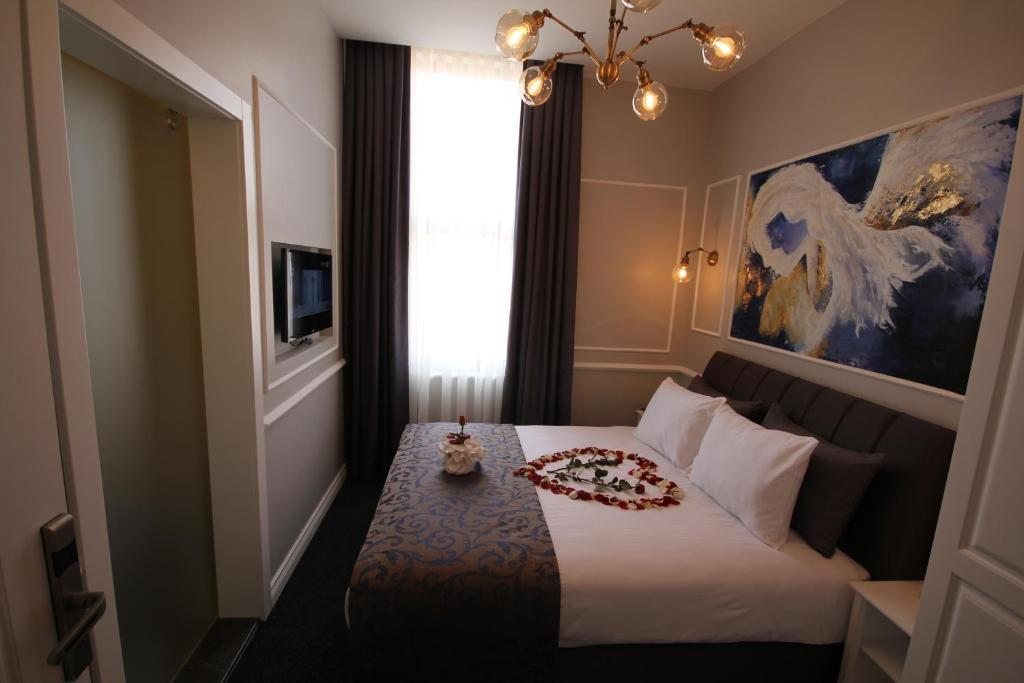 Двухместный (Двухместный номер с 1 кроватью или 2 отдельными кроватями) отеля Hotel Naumpasa Konagi, Стамбул