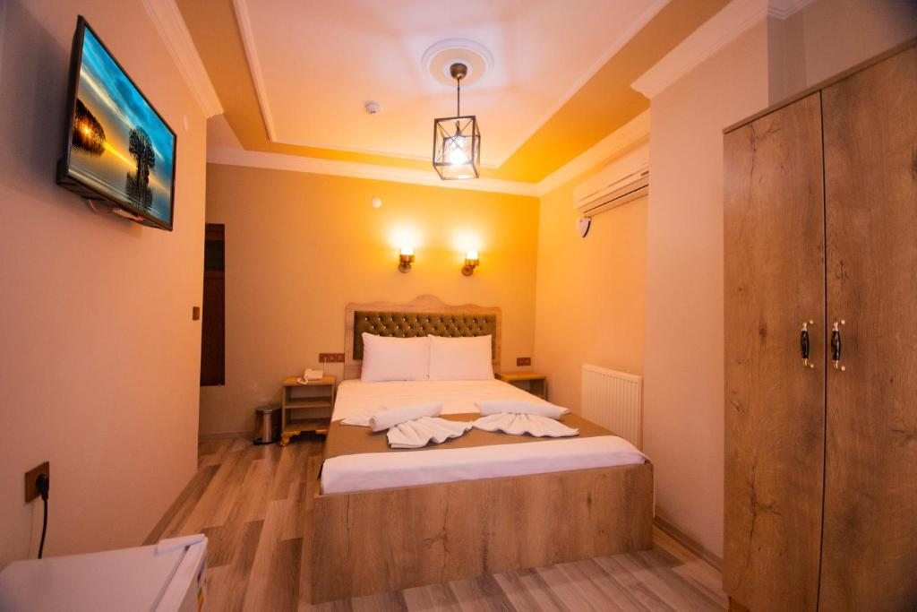 Двухместный (Стандартный двухместный номер с 1 кроватью или 2 отдельными кроватями) отеля Hotel Orkide, Стамбул