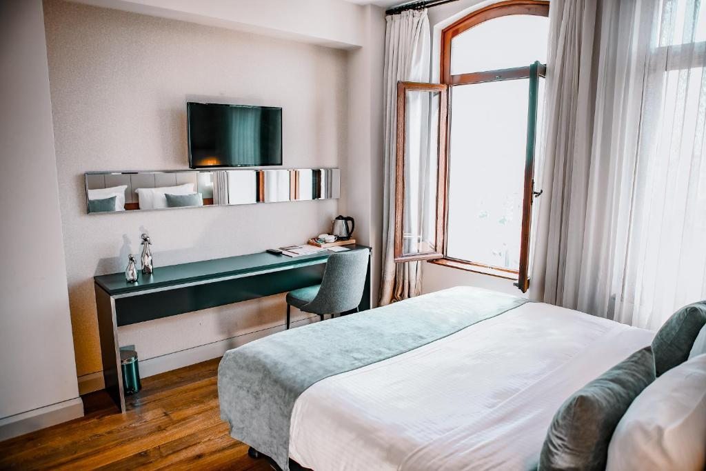 Двухместный (Двухместный номер с 1 кроватью или 2 отдельными кроватями, вид на город) отеля Juno Hotel Taksim, Стамбул