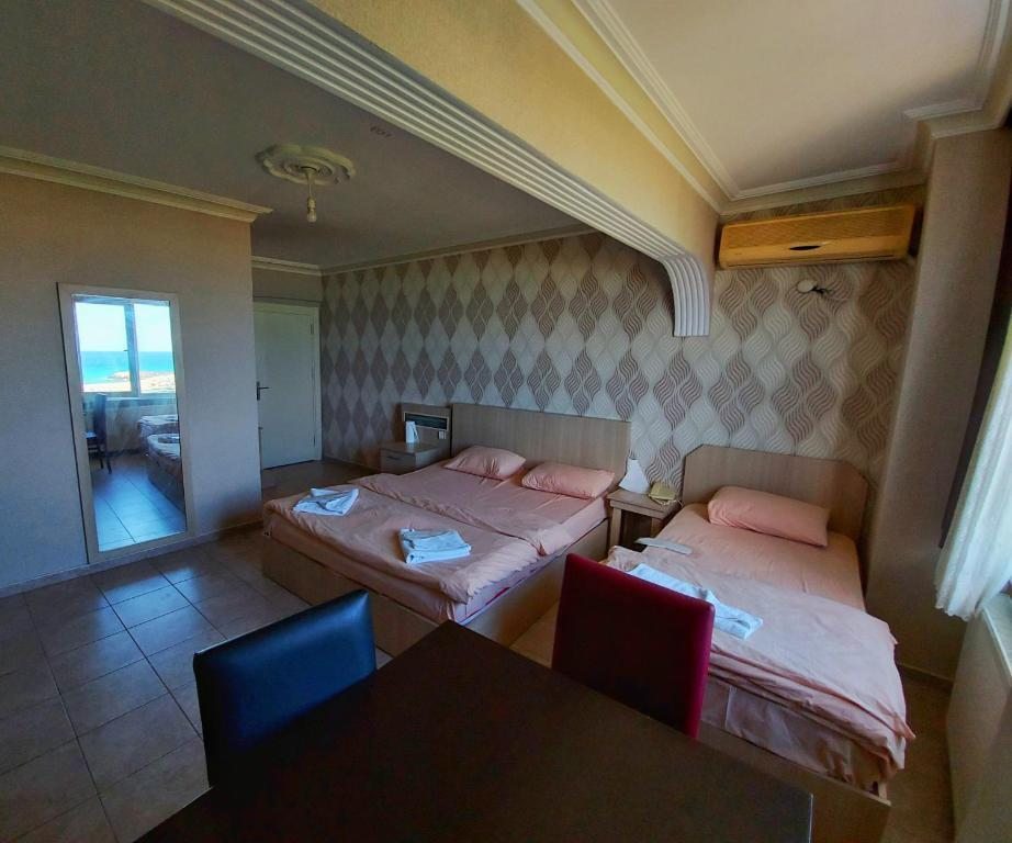 Двухместный (Двухместный номер Делюкс с 1 кроватью или 2 отдельными кроватями и видом на море) мотеля KILIÇ MOTEL, Стамбул