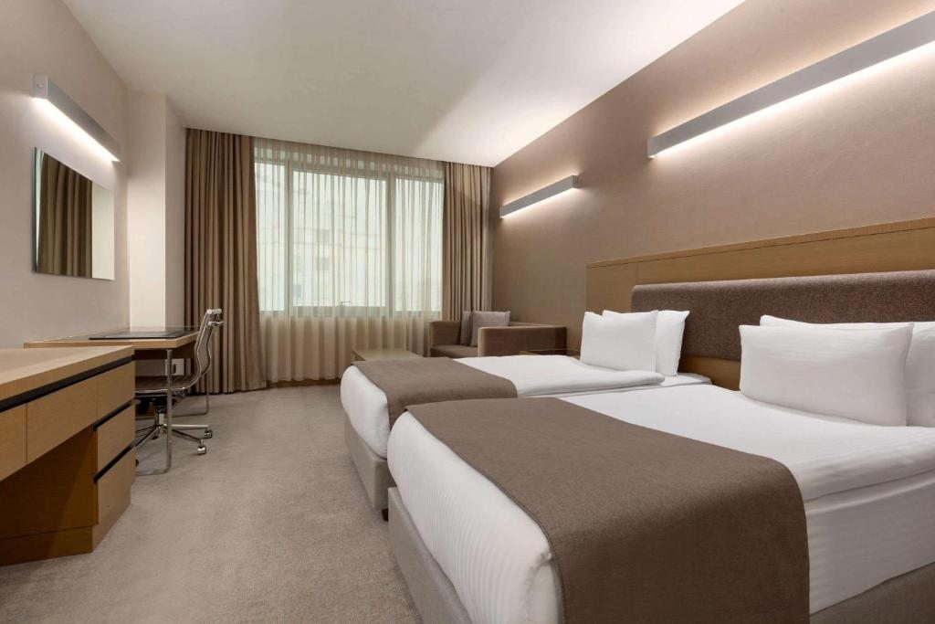Двухместный (Двухместный номер Делюкс с 2 отдельными кроватями) отеля La Quinta by Wyndham Istanbul Gunesli, Стамбул