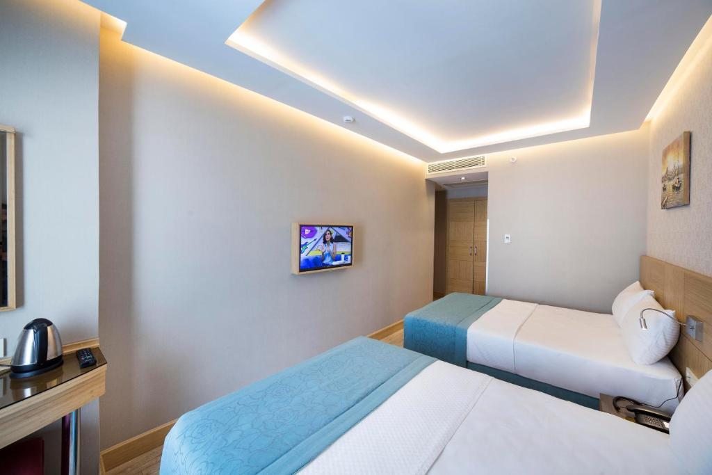 Двухместный (Просторный двухместный номер с 2 отдельными кроватями) отеля Meretto Hotel LALELİ, Стамбул
