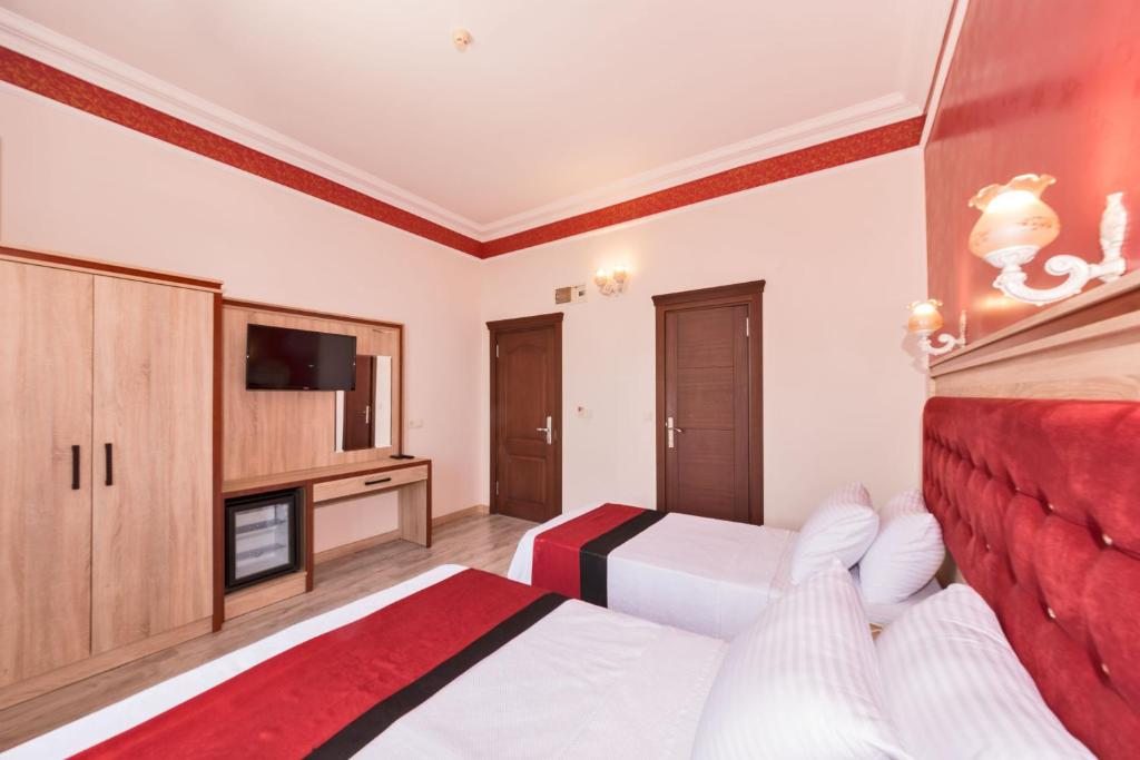 Двухместный (Двухместный номер Делюкс с 1 кроватью или 2 отдельными кроватями и видом на море) отеля Olimpic Hotel, Стамбул