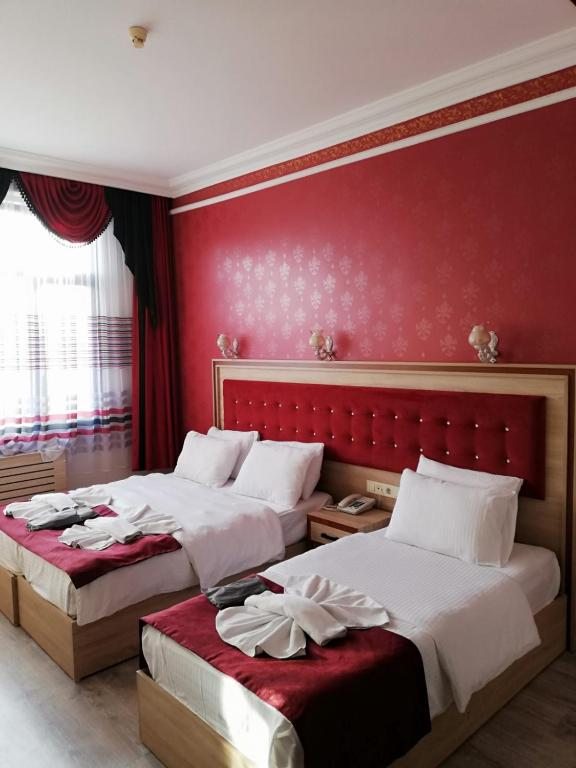 Трехместный (Трехместный номер Делюкс с видом на море) отеля Olimpic Hotel, Стамбул