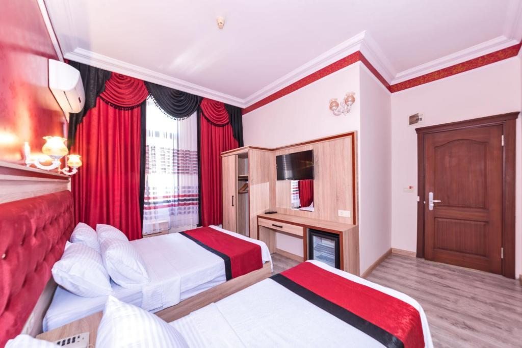Двухместный (Улучшенный двухместный номер с 1 кроватью) отеля Olimpic Hotel, Стамбул