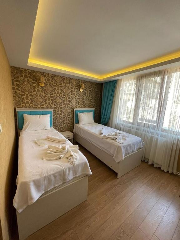 Двухместный (Стандартный двухместный номер с 1 кроватью или 2 отдельными кроватями) отеля Ora Bella Hotel, Стамбул