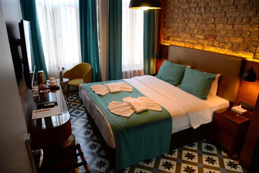 Двухместный (Улучшенный двухместный номер с 1 кроватью) отеля Pera Luna Residence, Стамбул