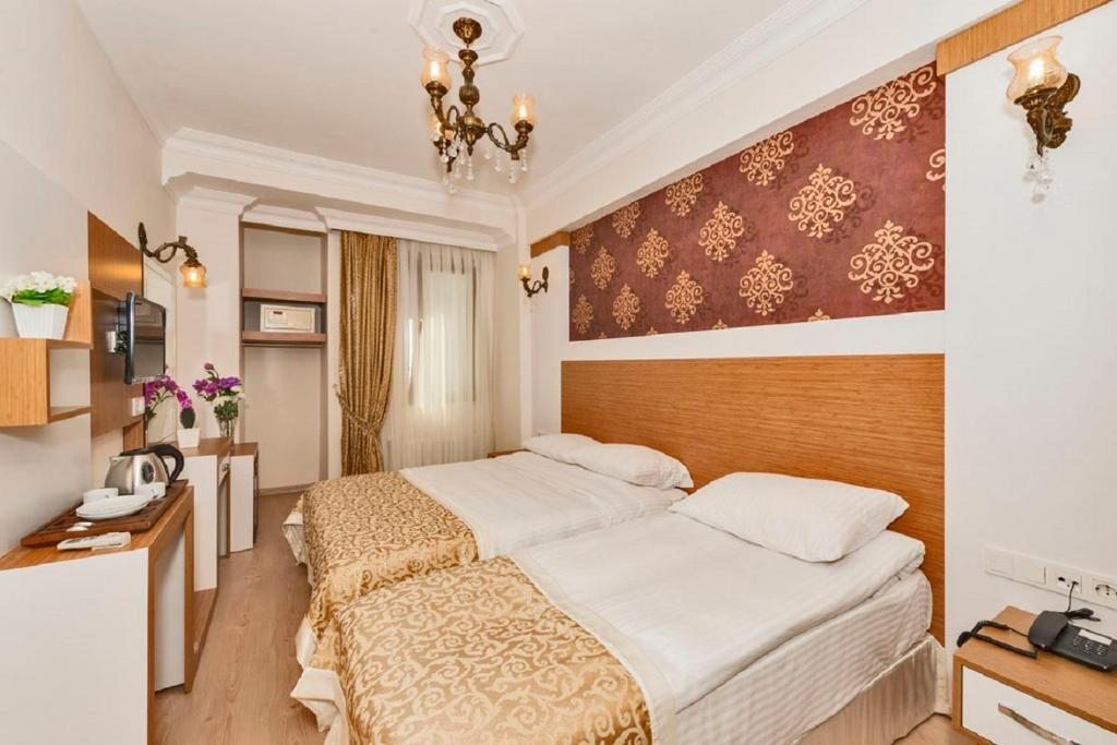 Трехместный (Стандартный трехместный номер) отеля Raimond Hotel, Стамбул