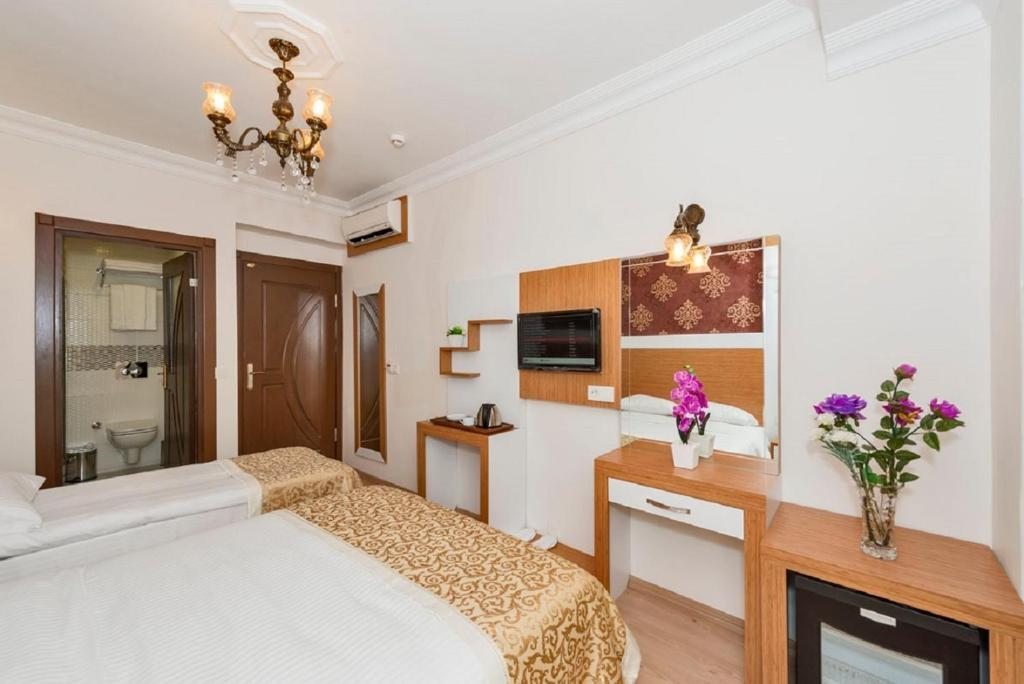 Двухместный (Двухместный номер с 2 отдельными кроватями) отеля Raimond Hotel, Стамбул