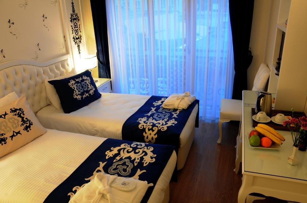 Двухместный (Двухместный номер с 1 кроватью или 2 отдельными кроватями) отеля Sarnic Premier Hotel & SPA, Стамбул