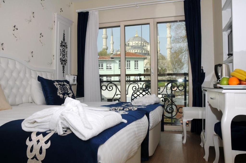 Двухместный (Двухместный номер Делюкс с 1 кроватью или 2 отдельными кроватями) отеля Sarnic Premier Hotel & SPA, Стамбул