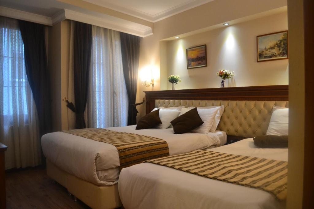 Трехместный (Стандартный трехместный номер) отеля Seven Days Hotel - İstanbul, Стамбул