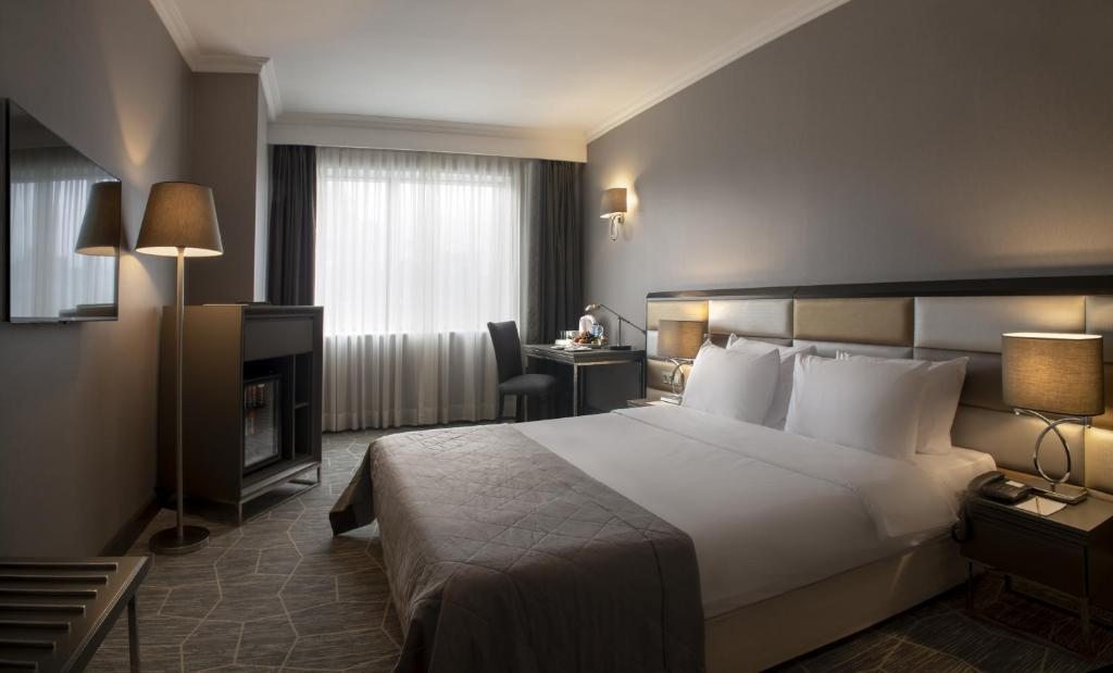Двухместный (Улучшенный двухместный номер с 1 кроватью или 2 отдельными кроватями) отеля Taksim Square Hotel, Стамбул