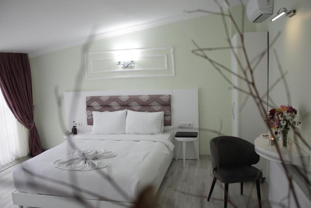 Двухместный (Двухместный номер Делюкс с 1 кроватью и балконом) отеля The Wolf Hotel, Стамбул