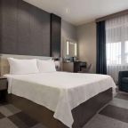 Трехместный (Номер Делюкс для некурящих с 1 кроватью размера 