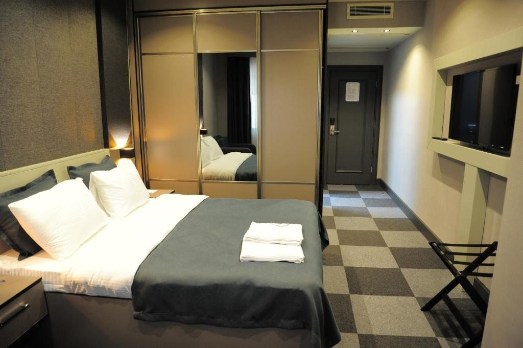 Трехместный (Номер Делюкс для некурящих с 1 кроватью размера 