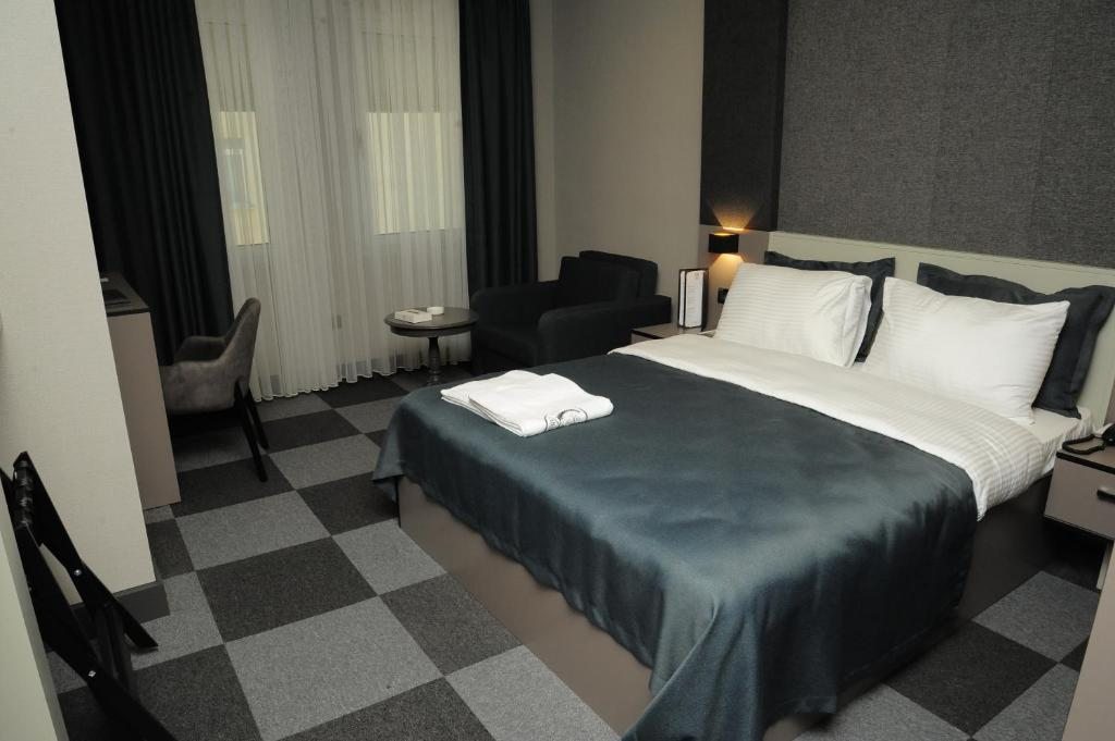 Трехместный (Номер Делюкс с 1 кроватью размера 