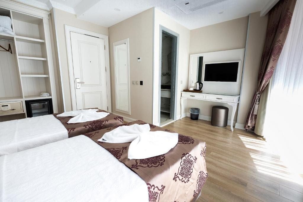Двухместный (Стандартный двухместный номер с 2 отдельными кроватями) отеля Villa Sweet Hotel, Стамбул
