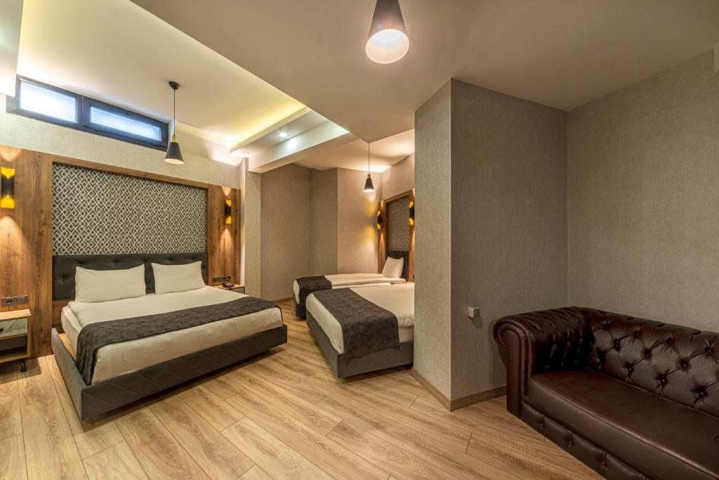 Четырехместный (Представительский номер с 2 кроватями размера «queen-size» — Цокольный этаж) отеля World Heritage Center Hotel, Стамбул