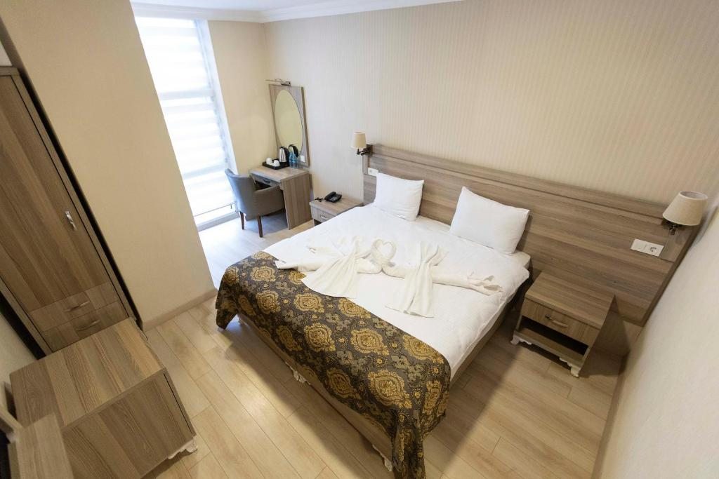 Двухместный (Стандартный двухместный номер с 1 кроватью или 2 отдельными кроватями) отеля World Point Hotel, Стамбул