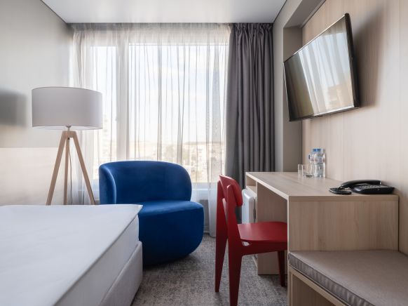 Фотография номера гостиницы Маринс Парк Отель 