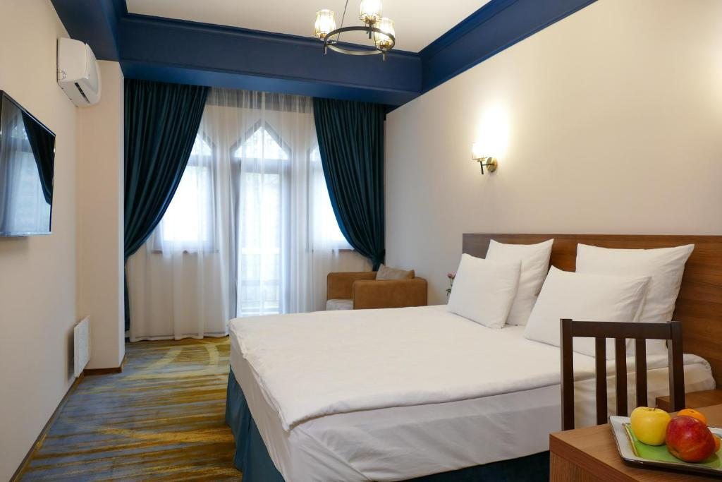 Двухместный (Стандартный двухместный номер с 1 кроватью или 2 отдельными кроватями) отеля Garuda Boutique Hotel, Сухум