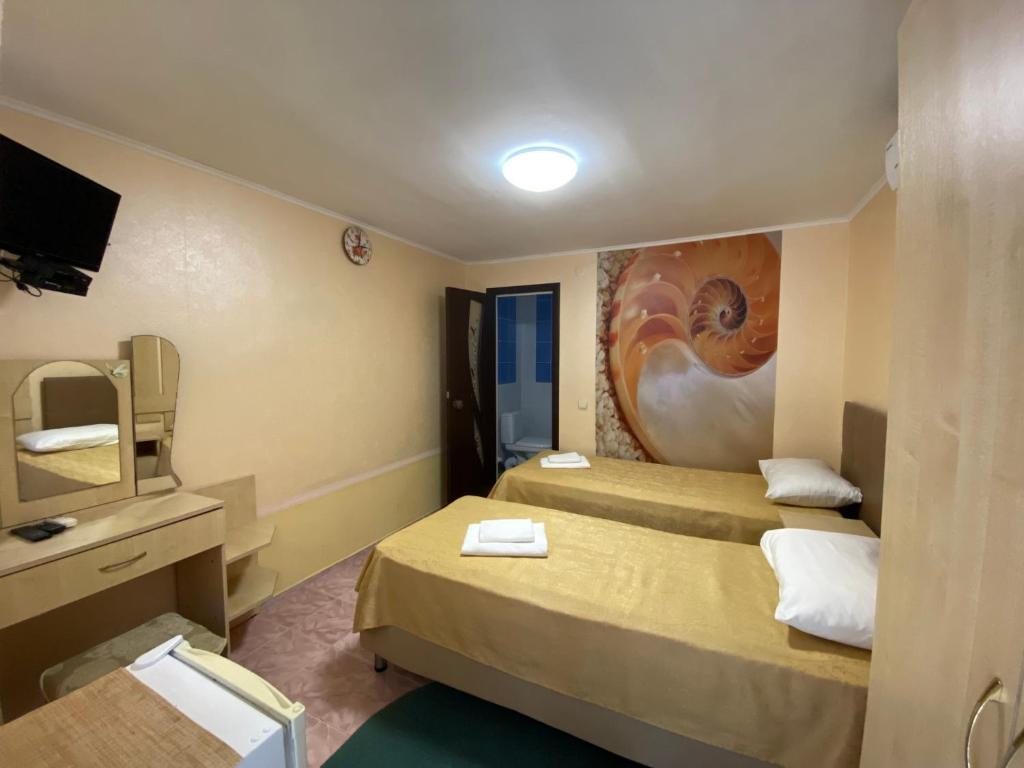 Двухместный (Бюджетный двухместный номер с 2 отдельными кроватями) отеля Primorie Guest House, Цандрипш