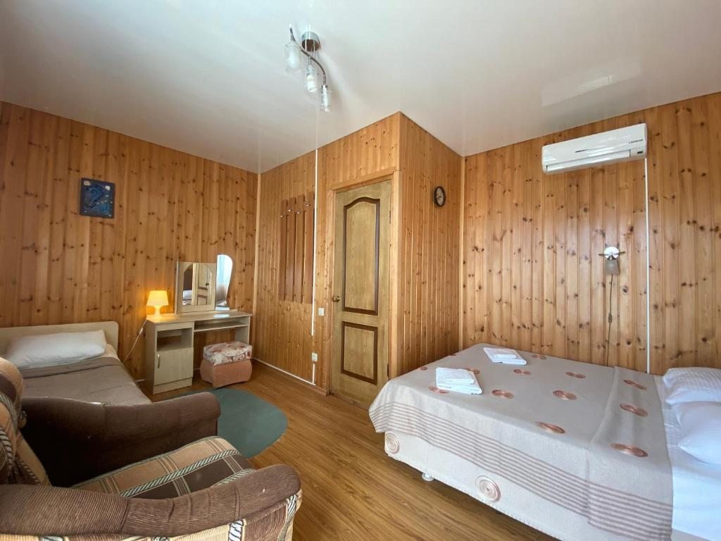 Трехместный (Трехместный номер с видом на море) отеля Primorie Guest House, Цандрипш