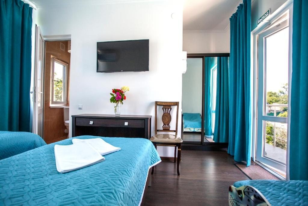 Двухместный (Двухместный номер Делюкс с 2 отдельными кроватями) отеля Family Resort Bambora, Гудаута