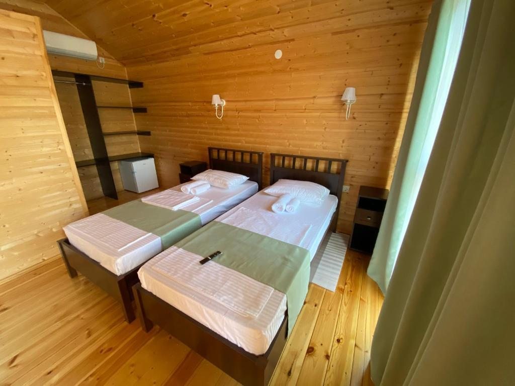 Двухместный (Двухместный номер с 2 отдельными кроватями) гостевого дома База отдыха Шезлонг, Гудаута